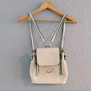 white backpack purse